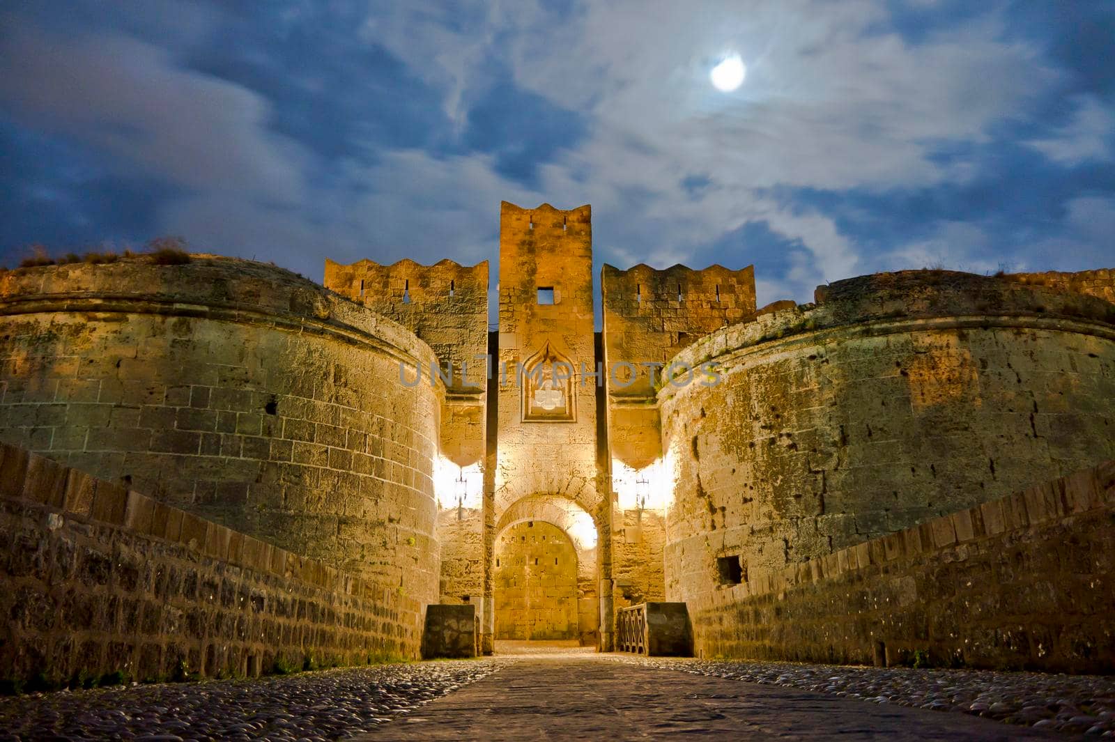 Rhodes Island, Old city street view by night, Castle Gate, Greece, Europe by giannakisphoto