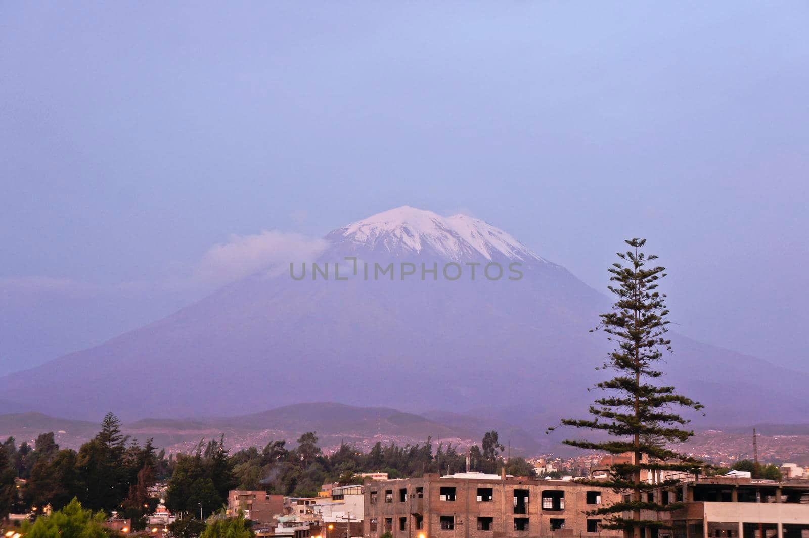 Arequipa, Old city street view and volcano El Misty, Peru, South America by giannakisphoto