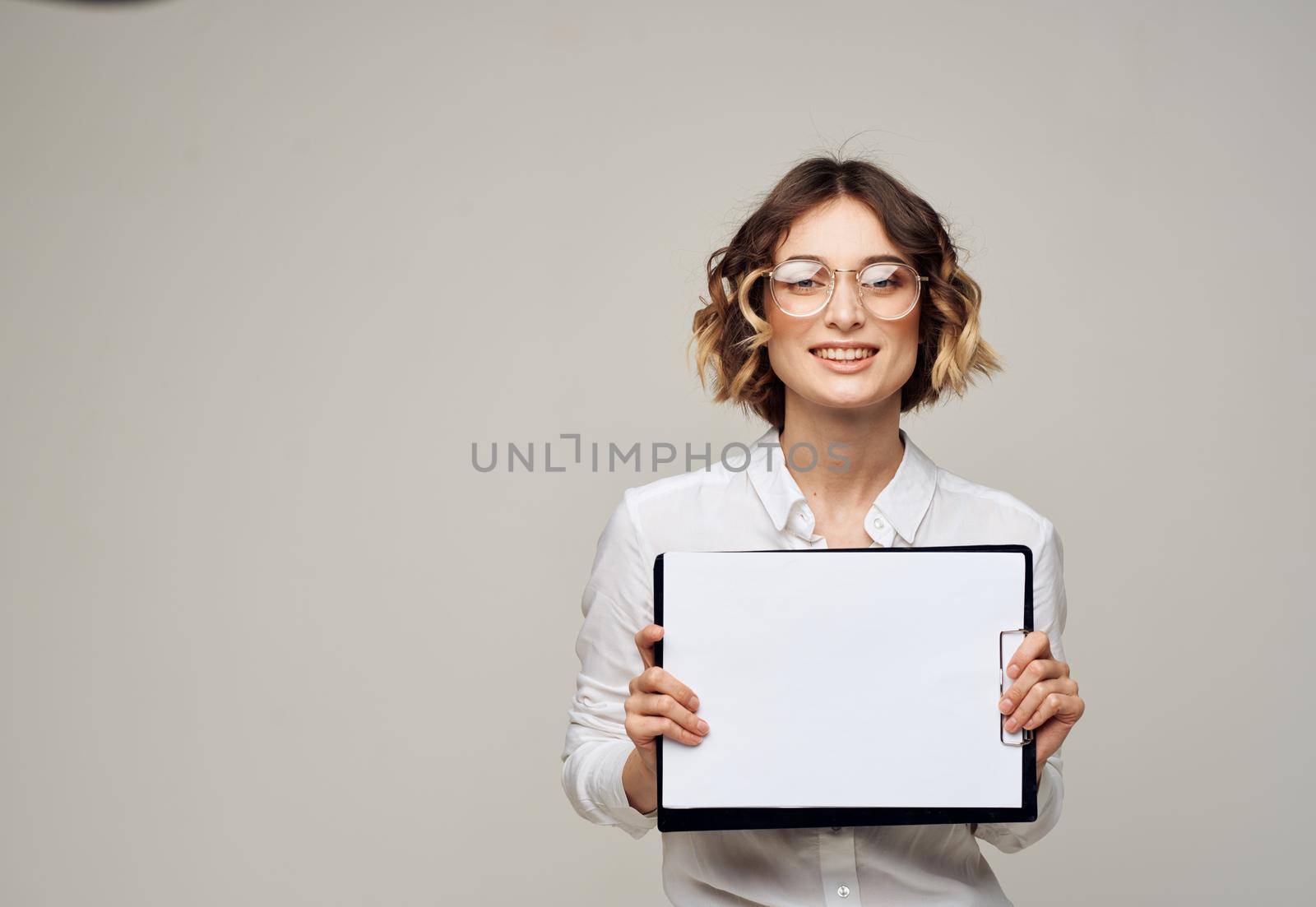 Business woman in shirt with document folder Blank paper mockup. High quality photo