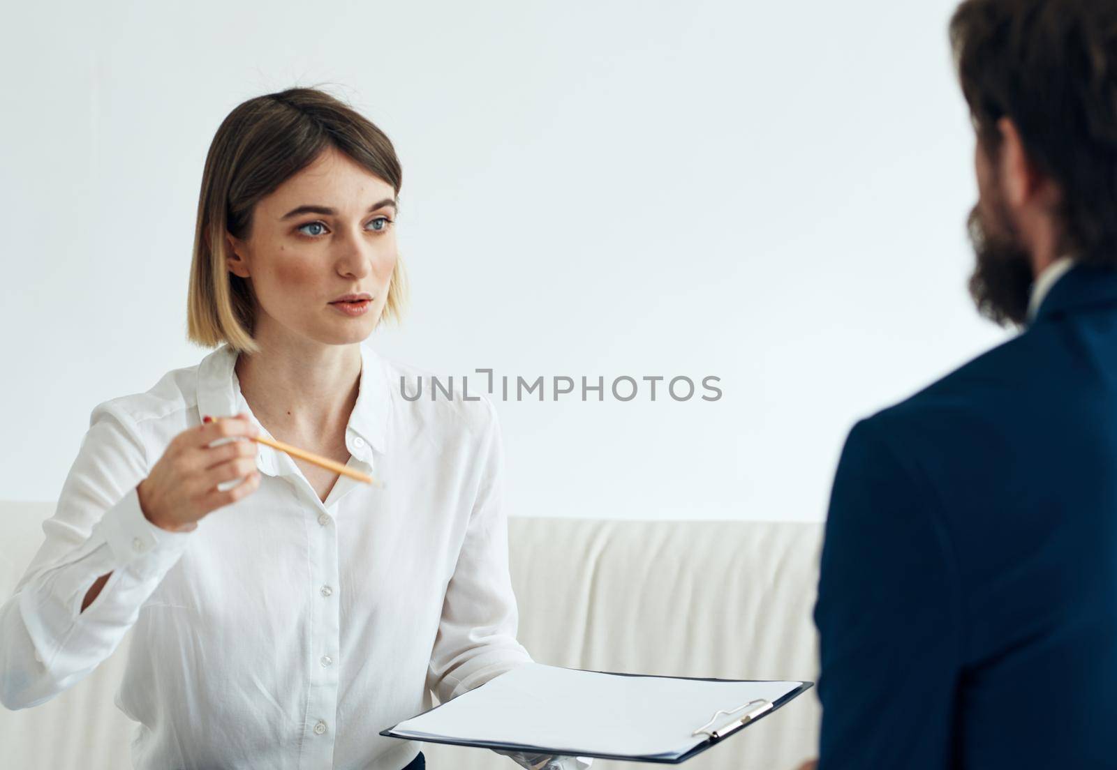 resume woman and man suit documents communication people jobs. High quality photo