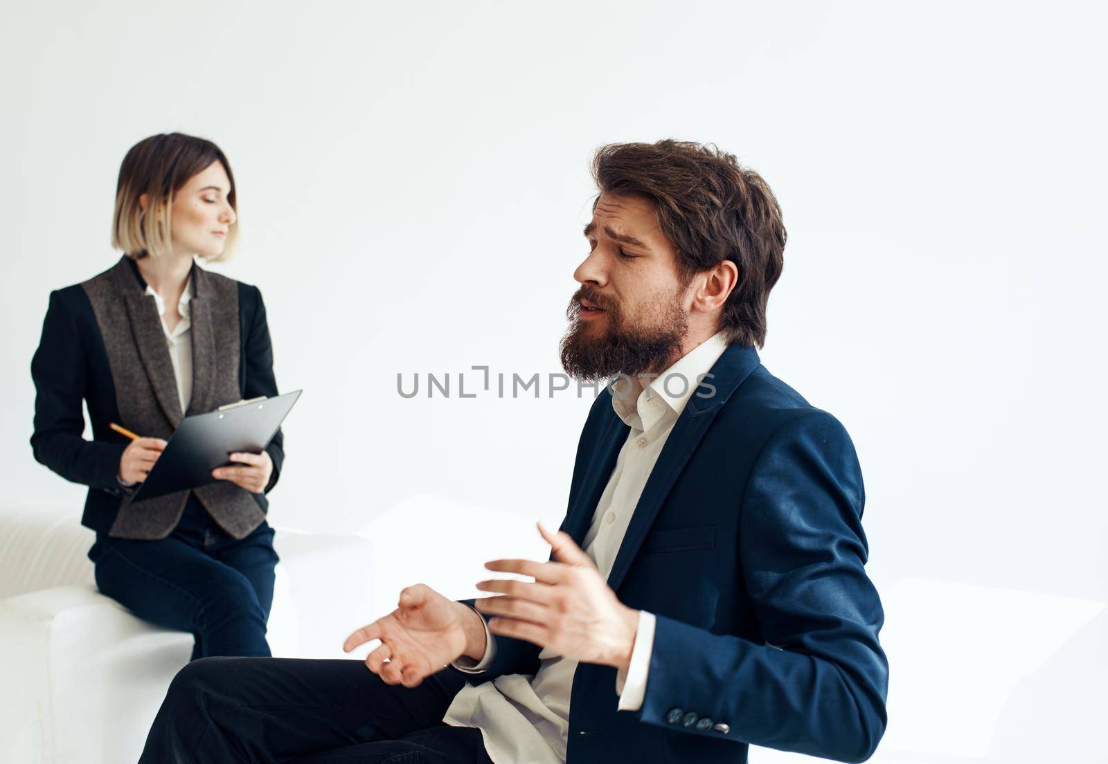 Women and men in suits In the bright room of interviews hiring. High quality photo