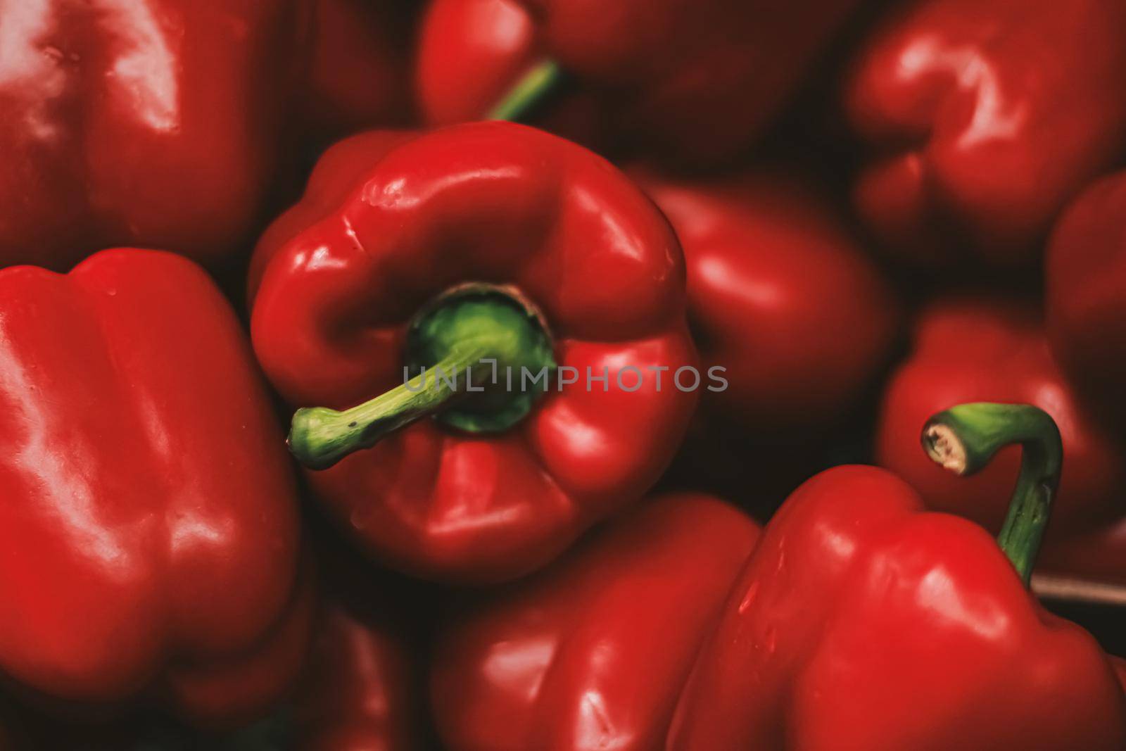 Red bell peppers on farmers market, organic food and agriculture concept