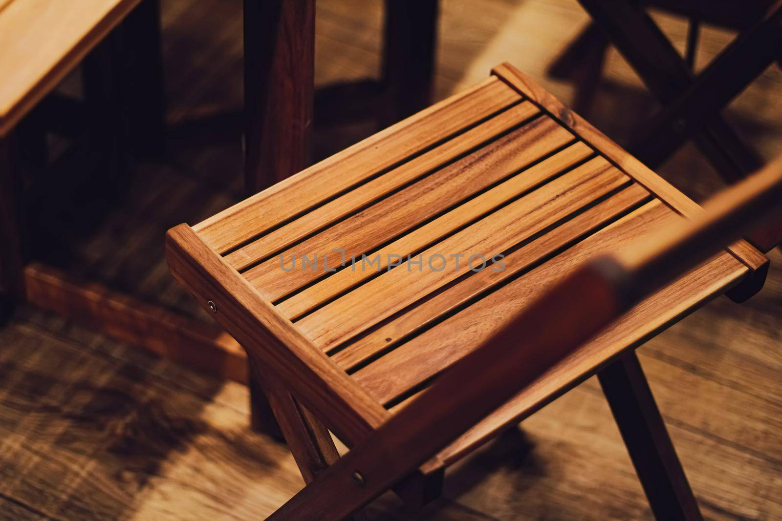 Wooden furniture as patio decoration and home decor closeup