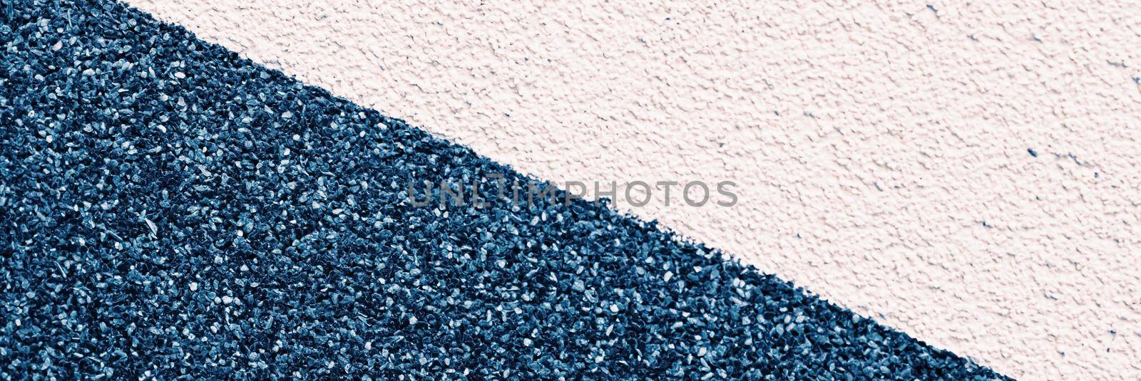 Duotone stucco wall texture as grunge background and urban detail closeup