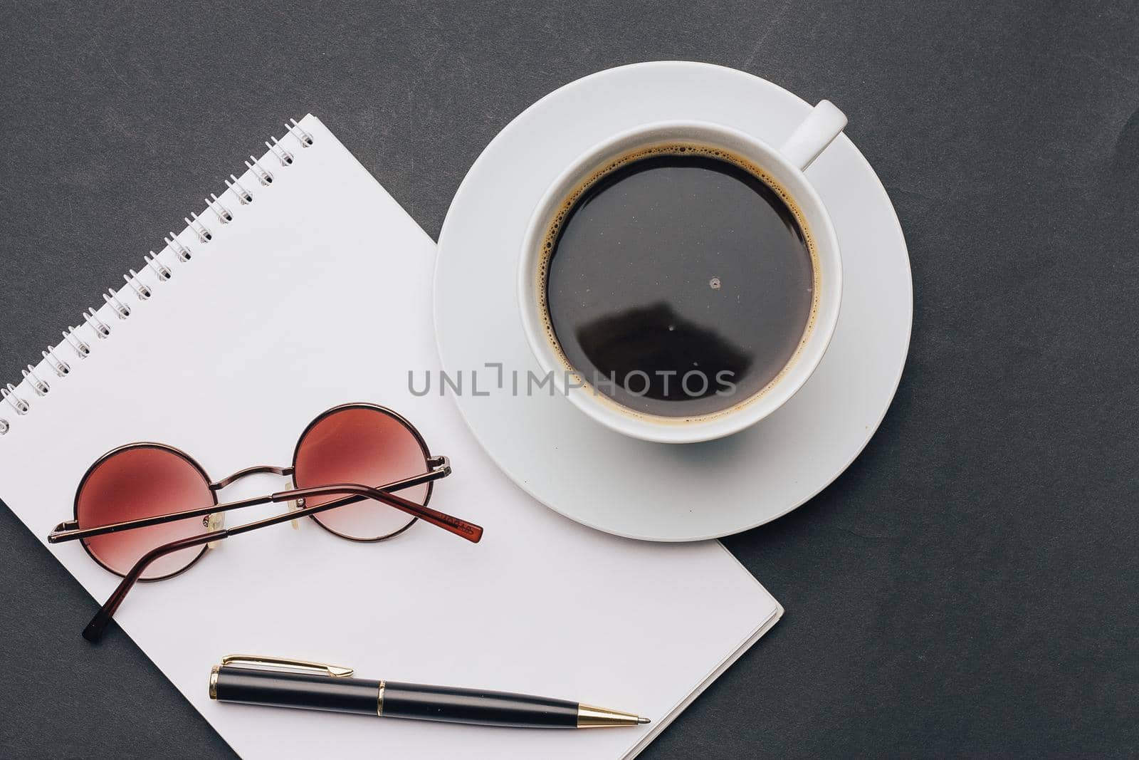 coffee cup notepad handle glasses office. High quality photo