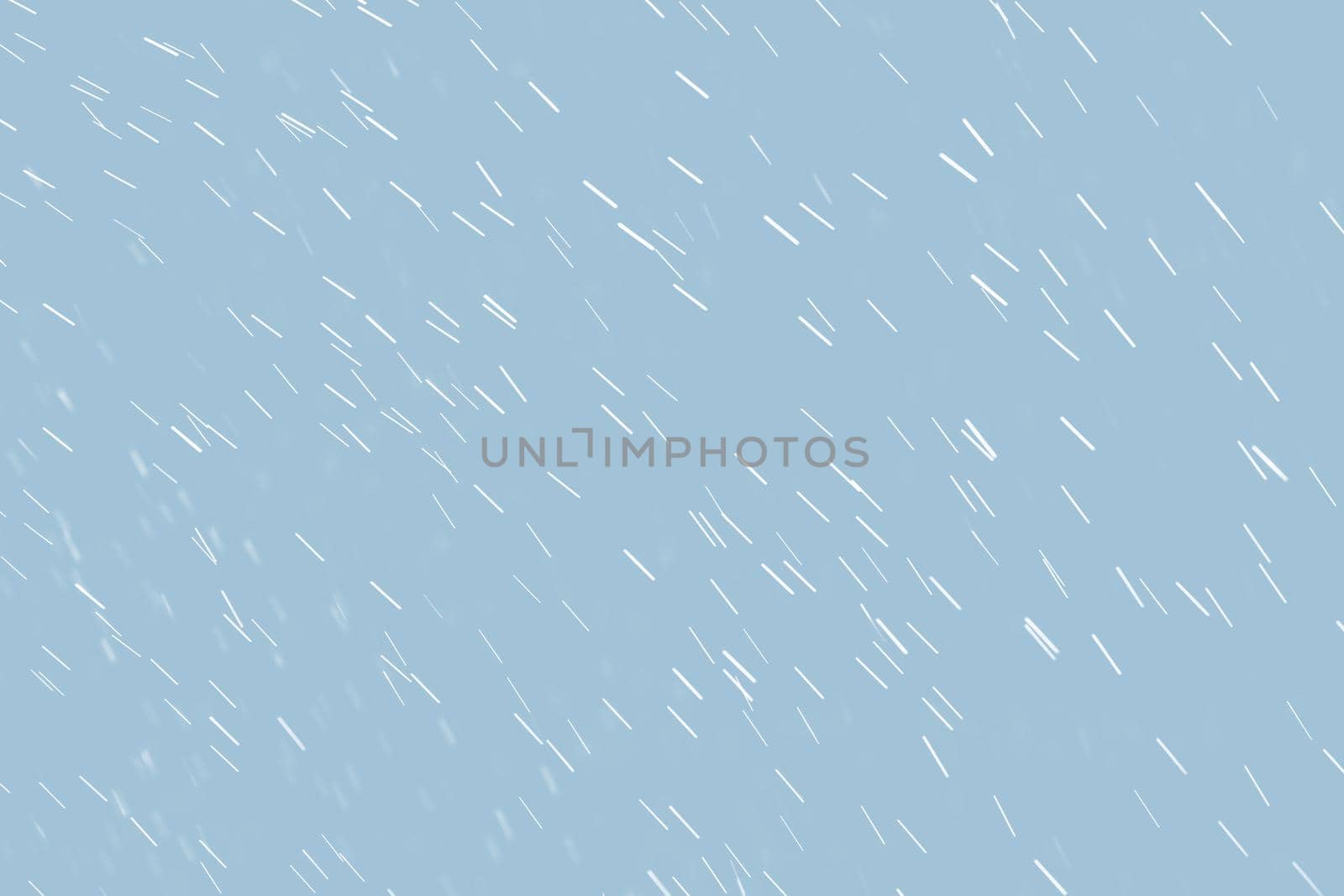 Abstract background of raindrops in light blue tonality