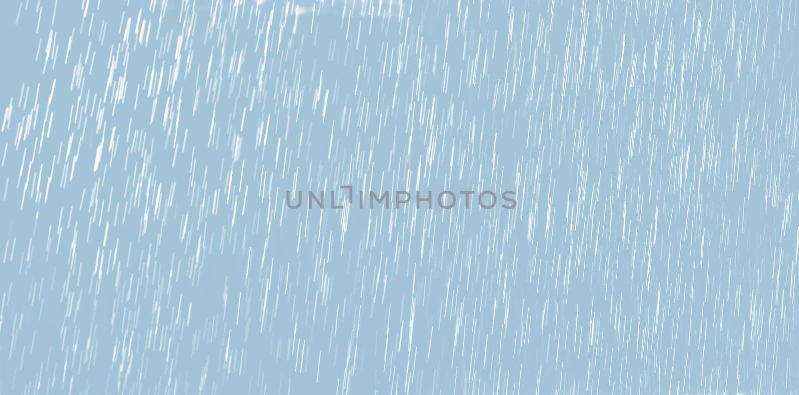 Abstract background of raindrops in light blue tonality