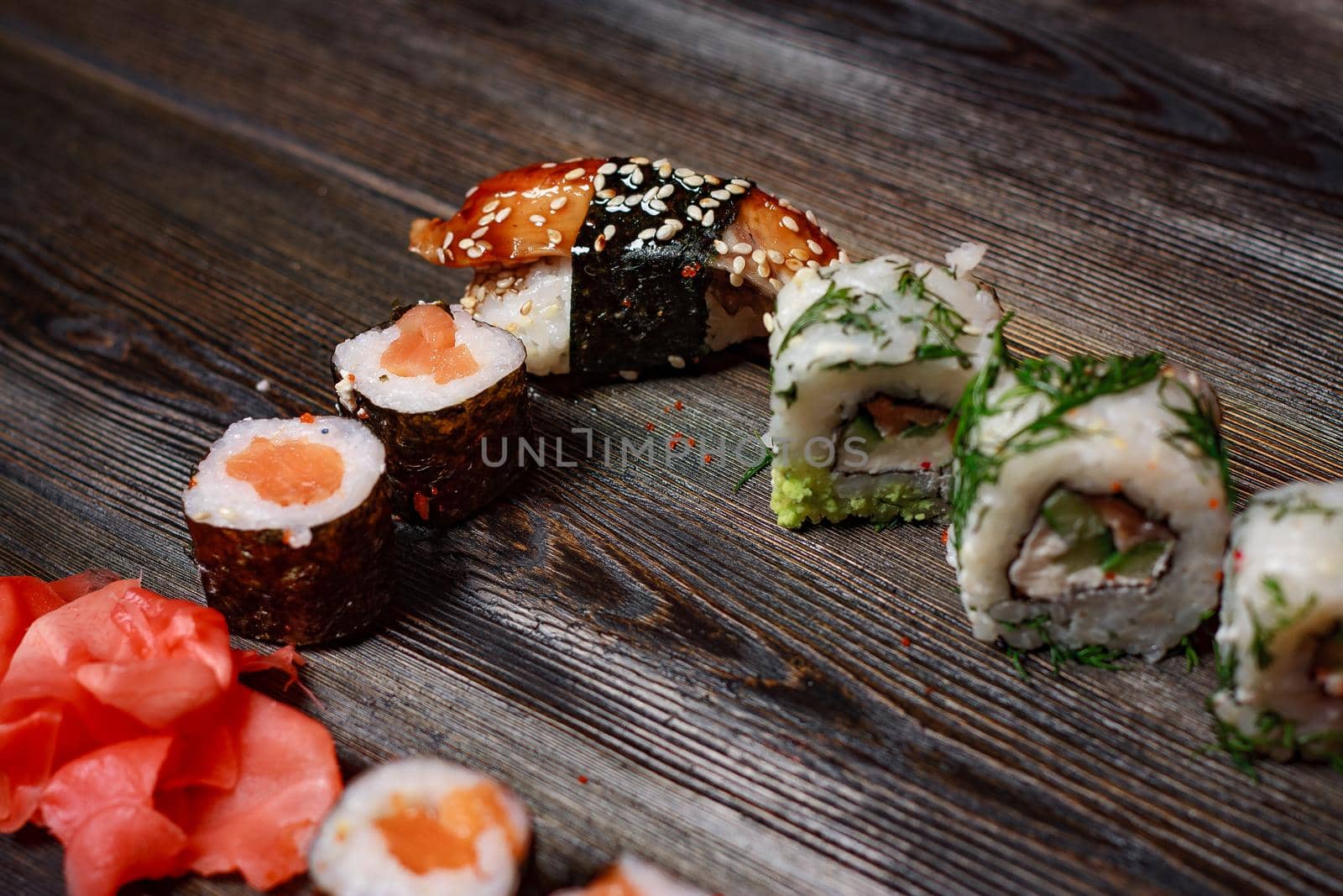 sushi rolls ginger chopsticks delicacy asian cuisine snack. High quality photo