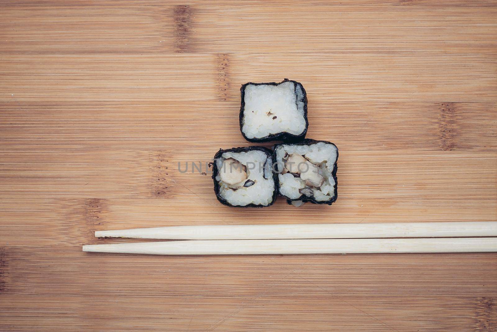 sushi chopsticks restaurant wood cutting board asian food. High quality photo