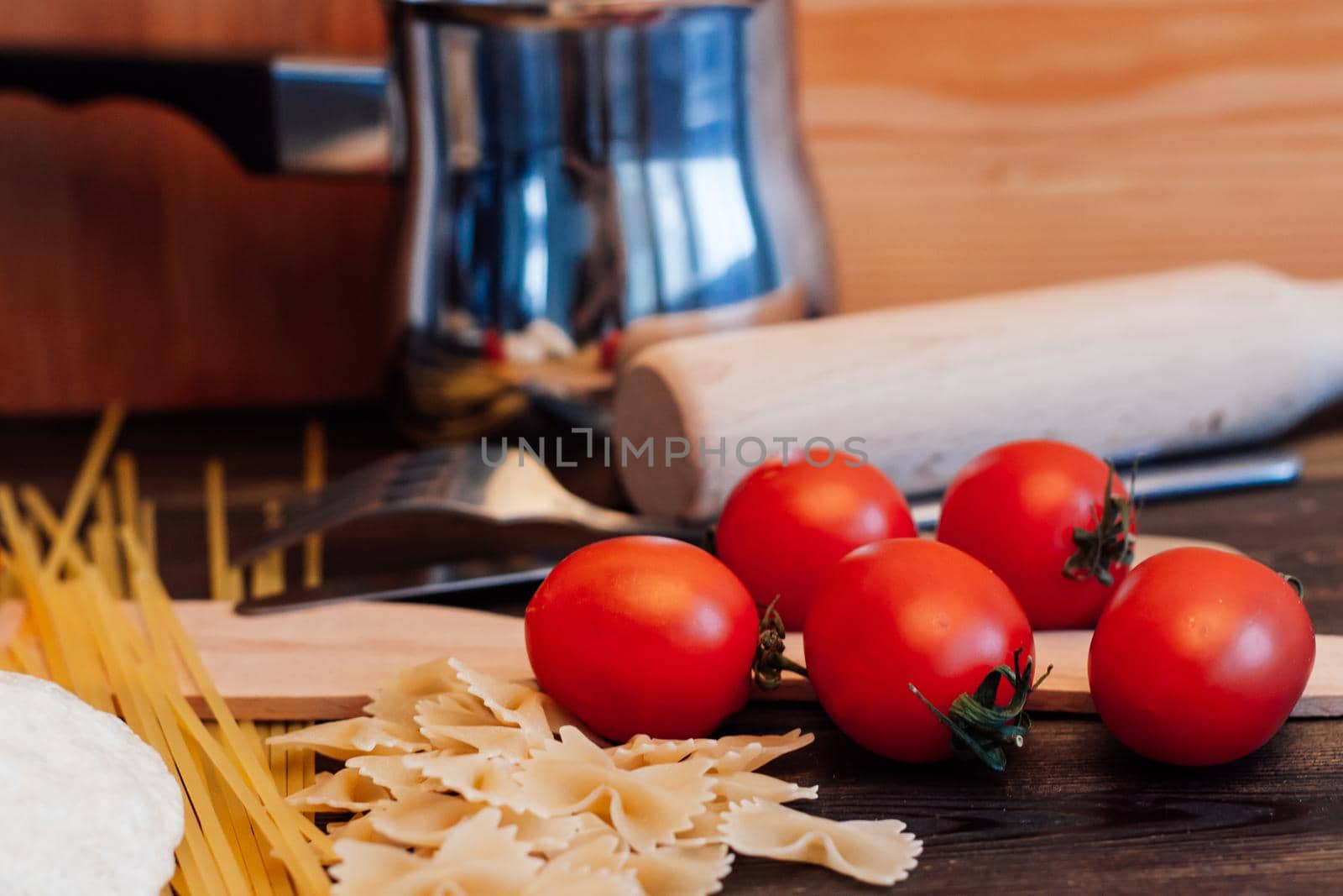 cherry tomatoes pasta ingredients for cooking italian cuisine lunch. High quality photo