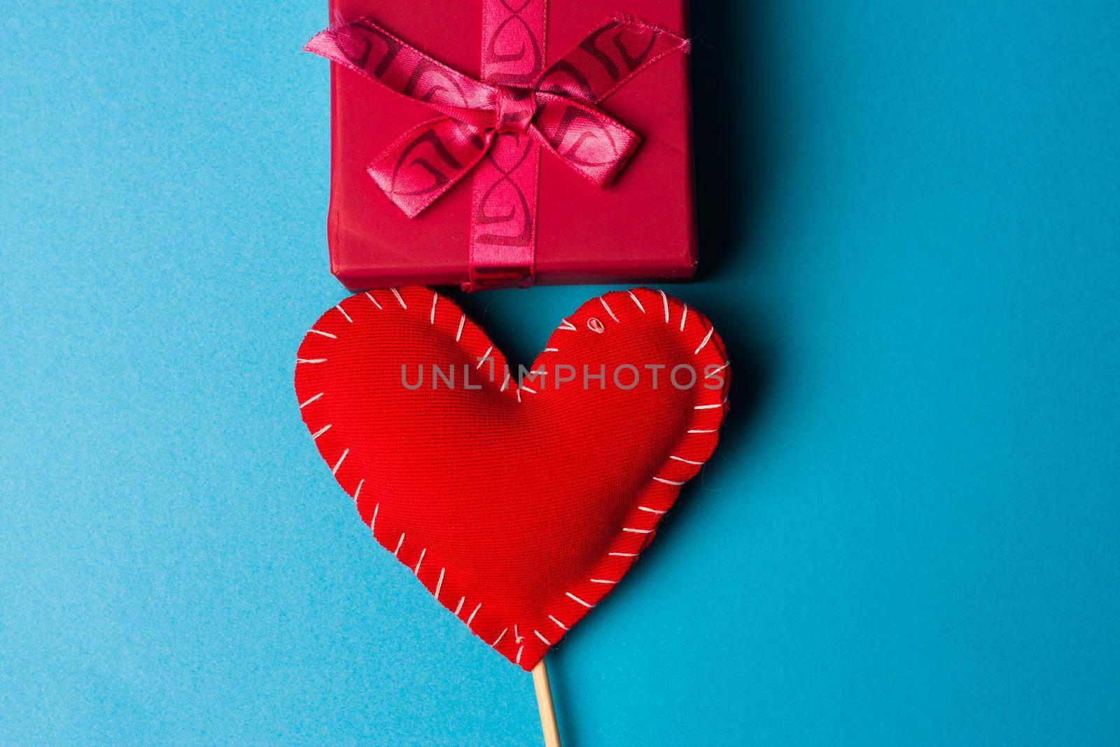 Heart decoration blue background holiday valentine gift. High quality photo