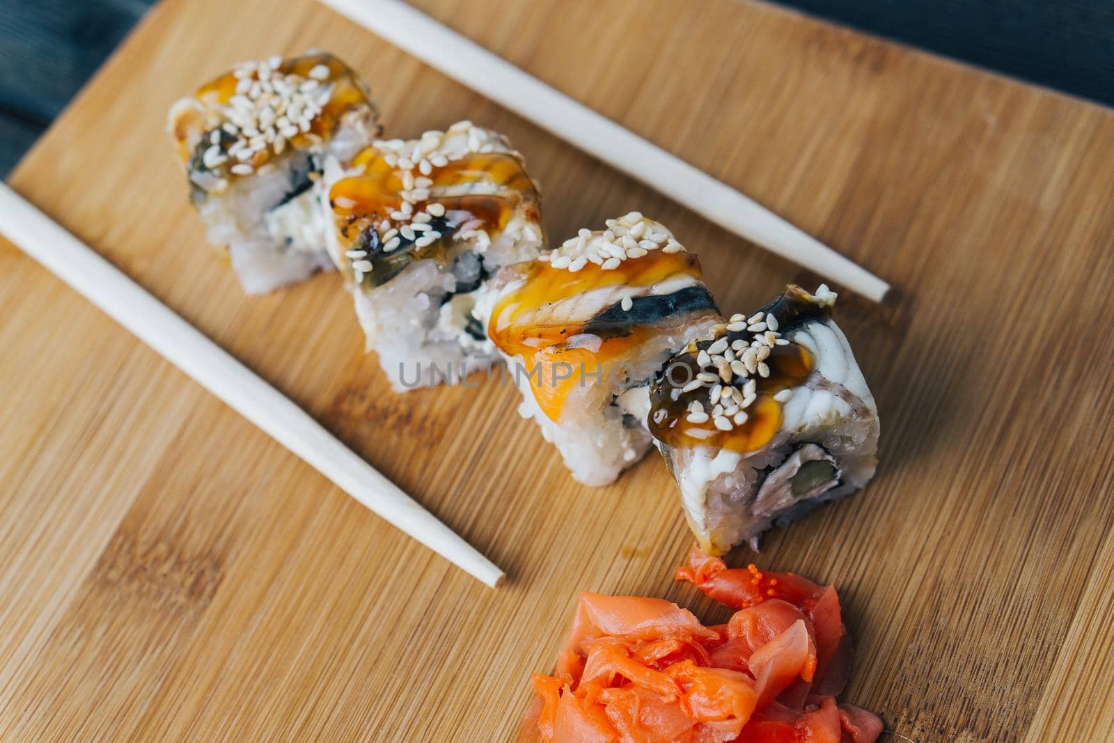Sushi chopsticks red ginger japanese cuisine delivery top view. High quality photo