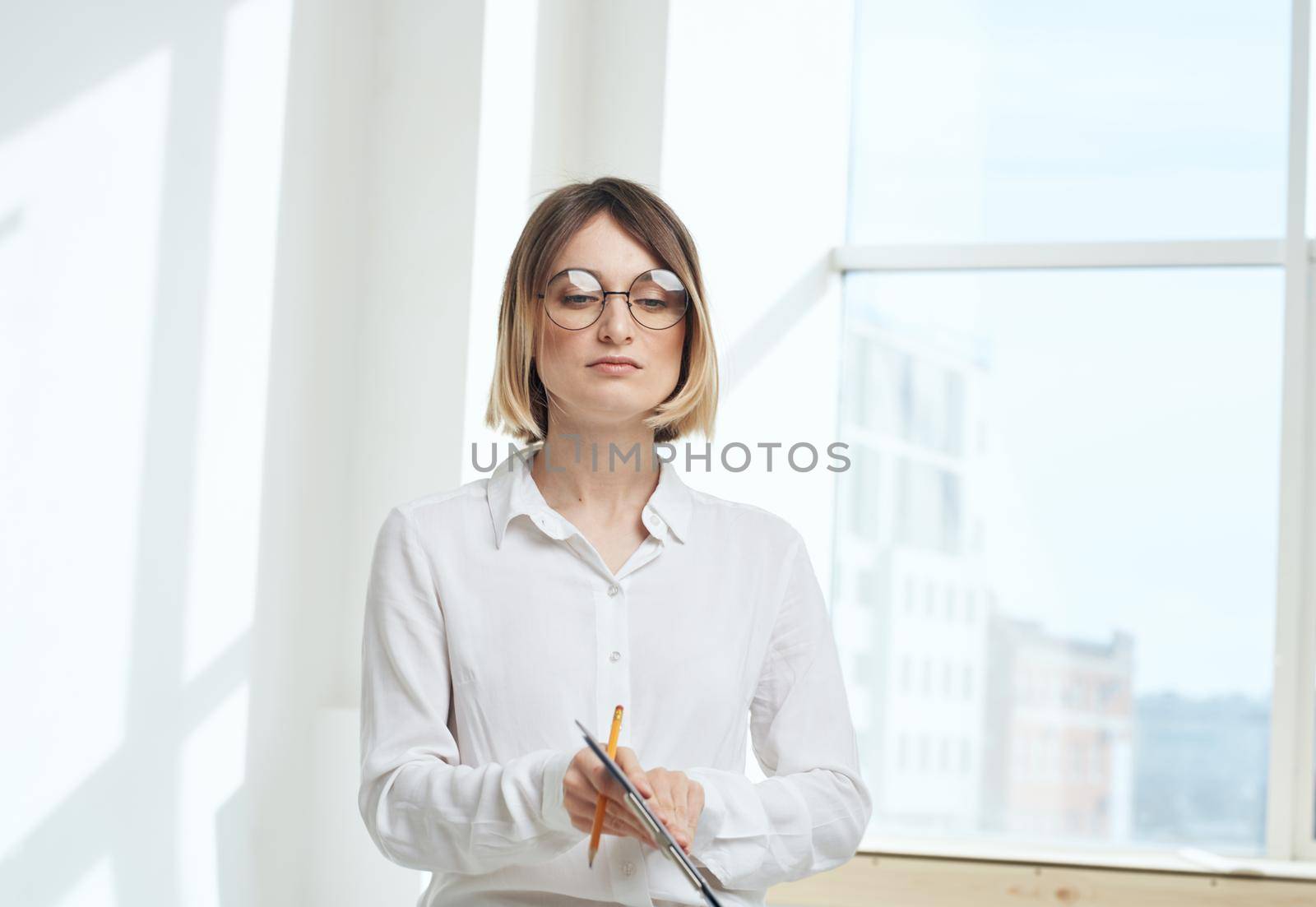 room finance woman business documents interior window. High quality photo