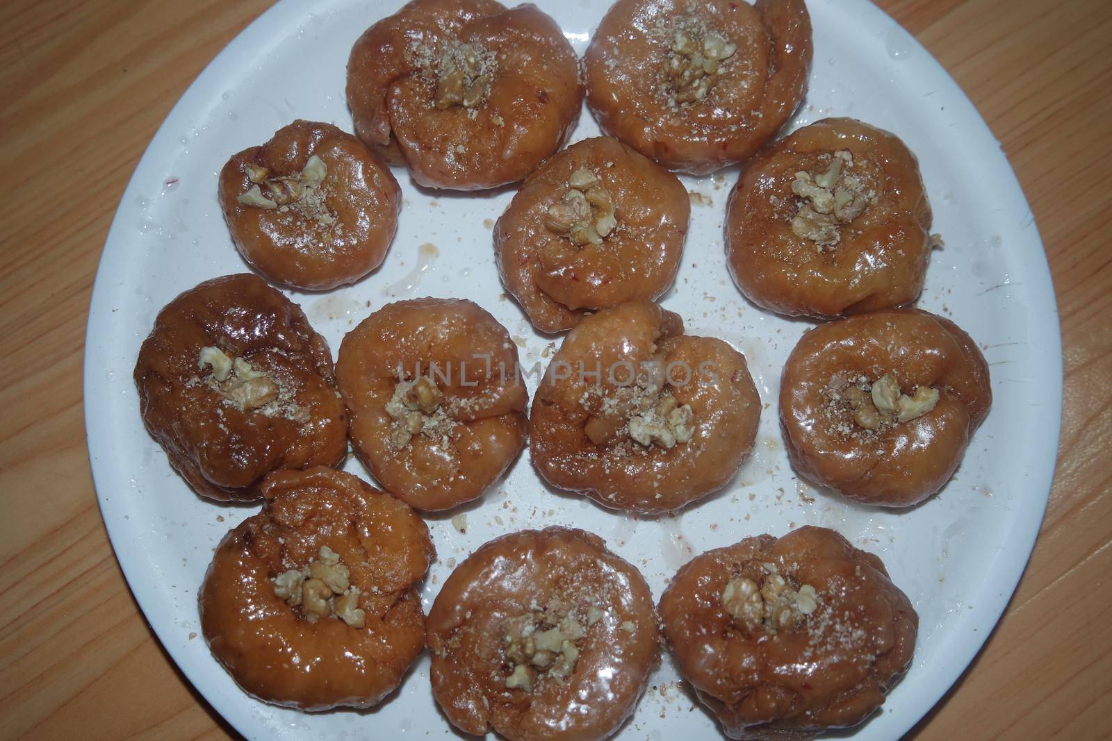 Closeup of delicious and tasty Asian sweet dish called balu shahi or baloshahi. by Photochowk