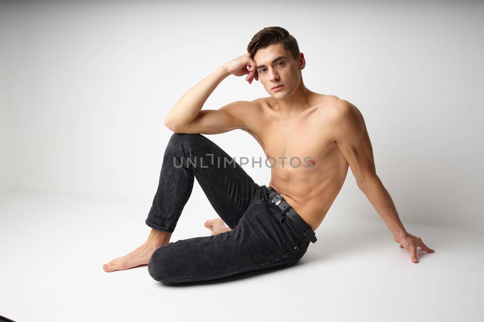 handsome male topless black pants studio model by SHOTPRIME