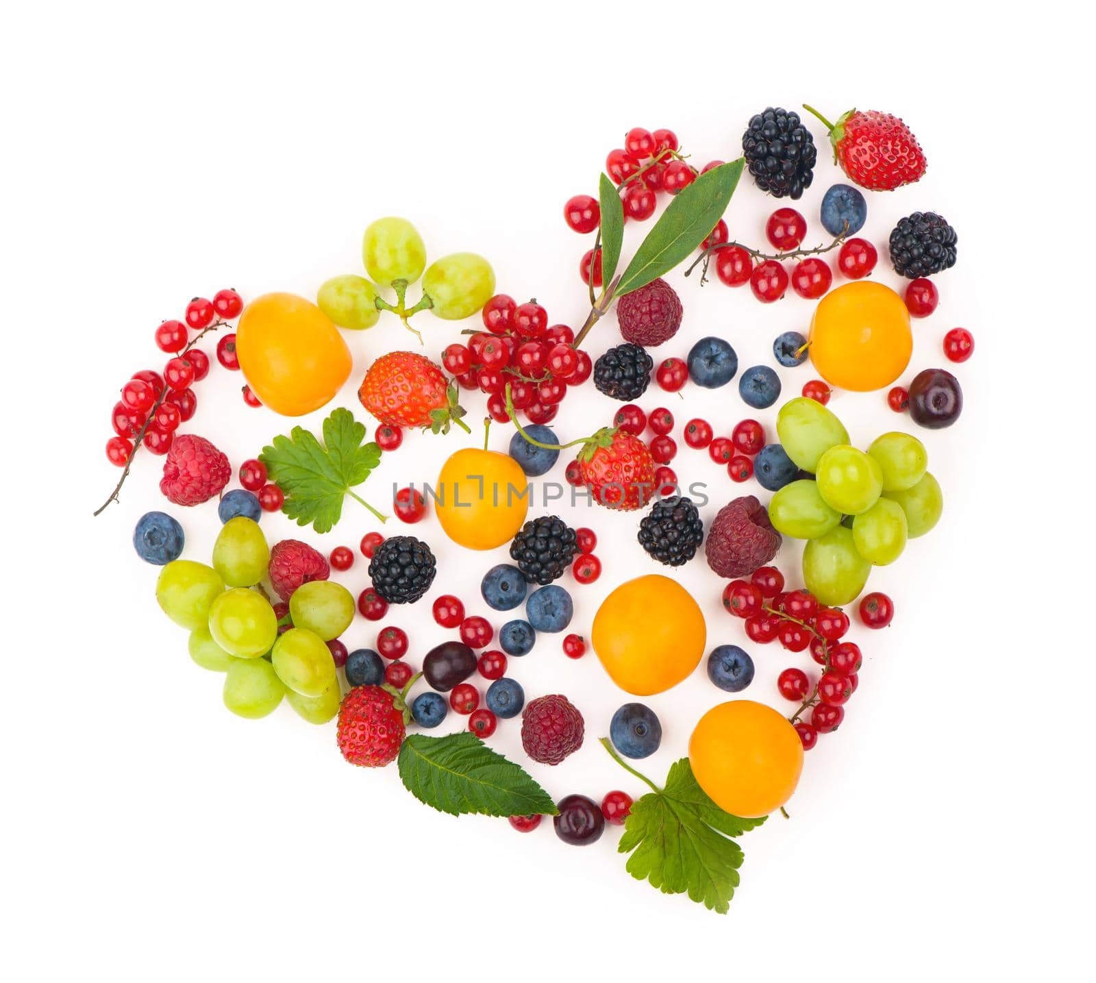 Heart shape assorted berry fruits on white background. Black-blue and red food. Mixed berries with copy space for text. Various fresh summer berries. Berries in heart shape isolateed on a white.