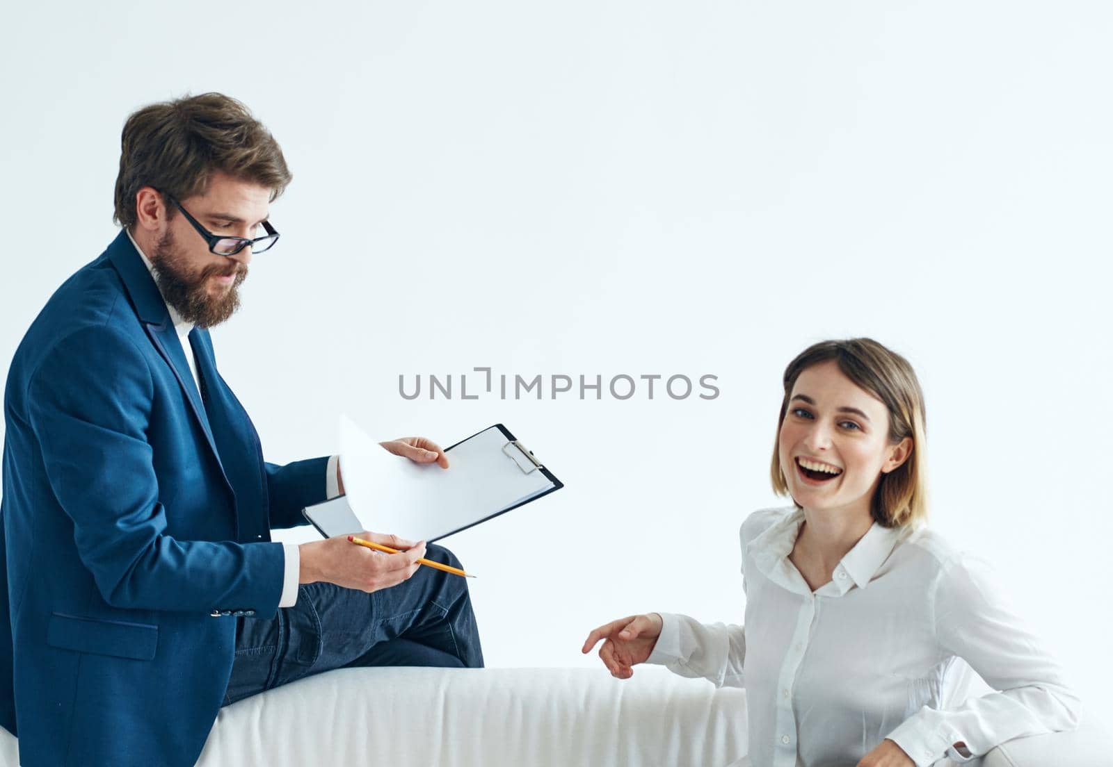 Business man and woman officials colleagues at work office message. High quality photo