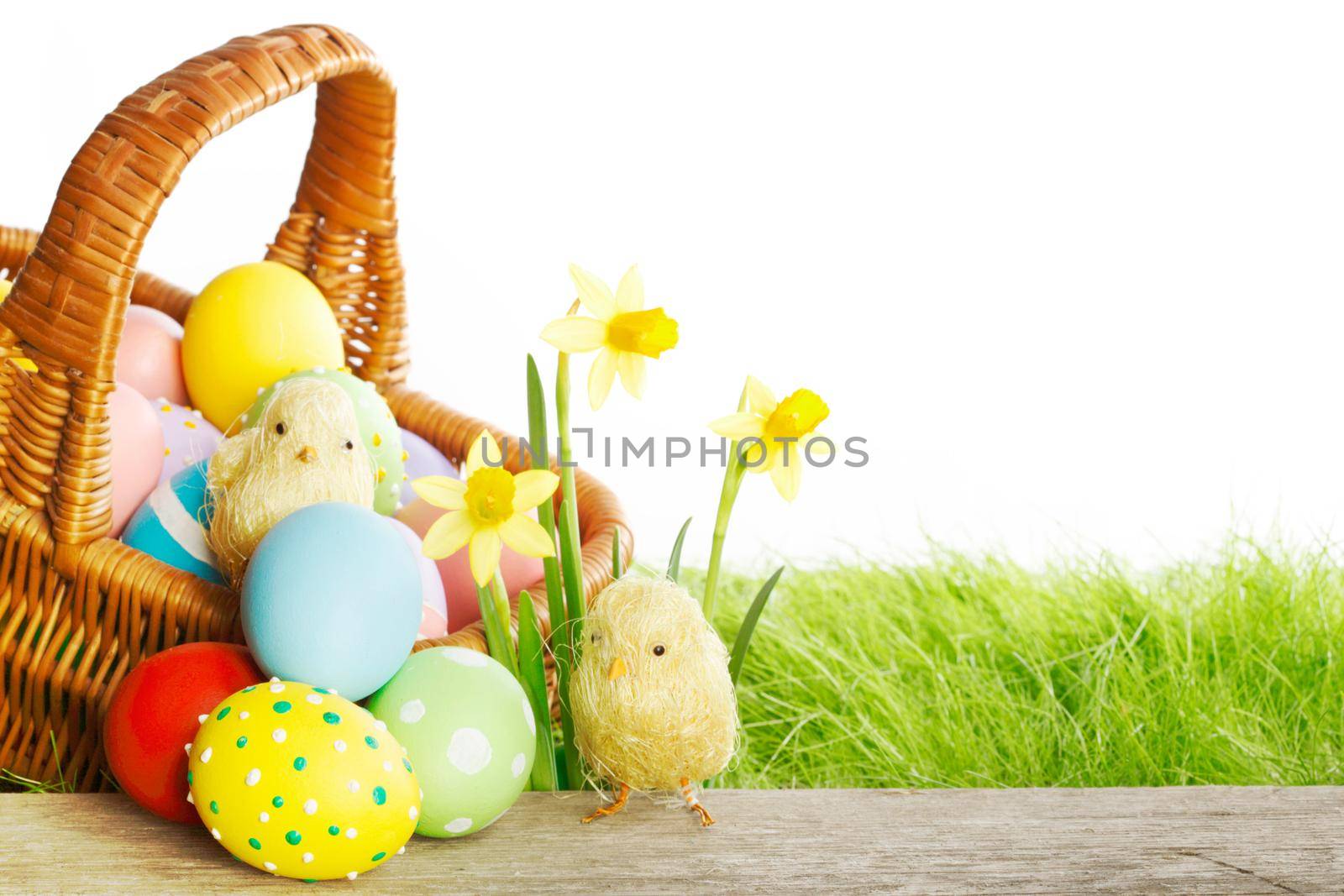 Easter basket on meadow by Yellowj
