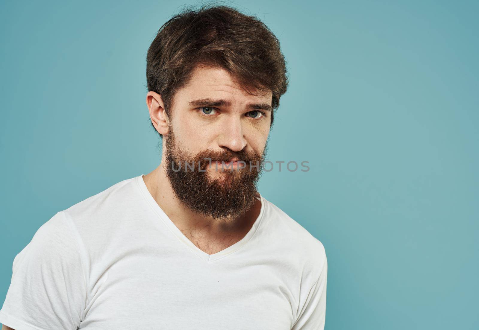 Portrait cropped view of male bushy beard brunette model. High quality photo
