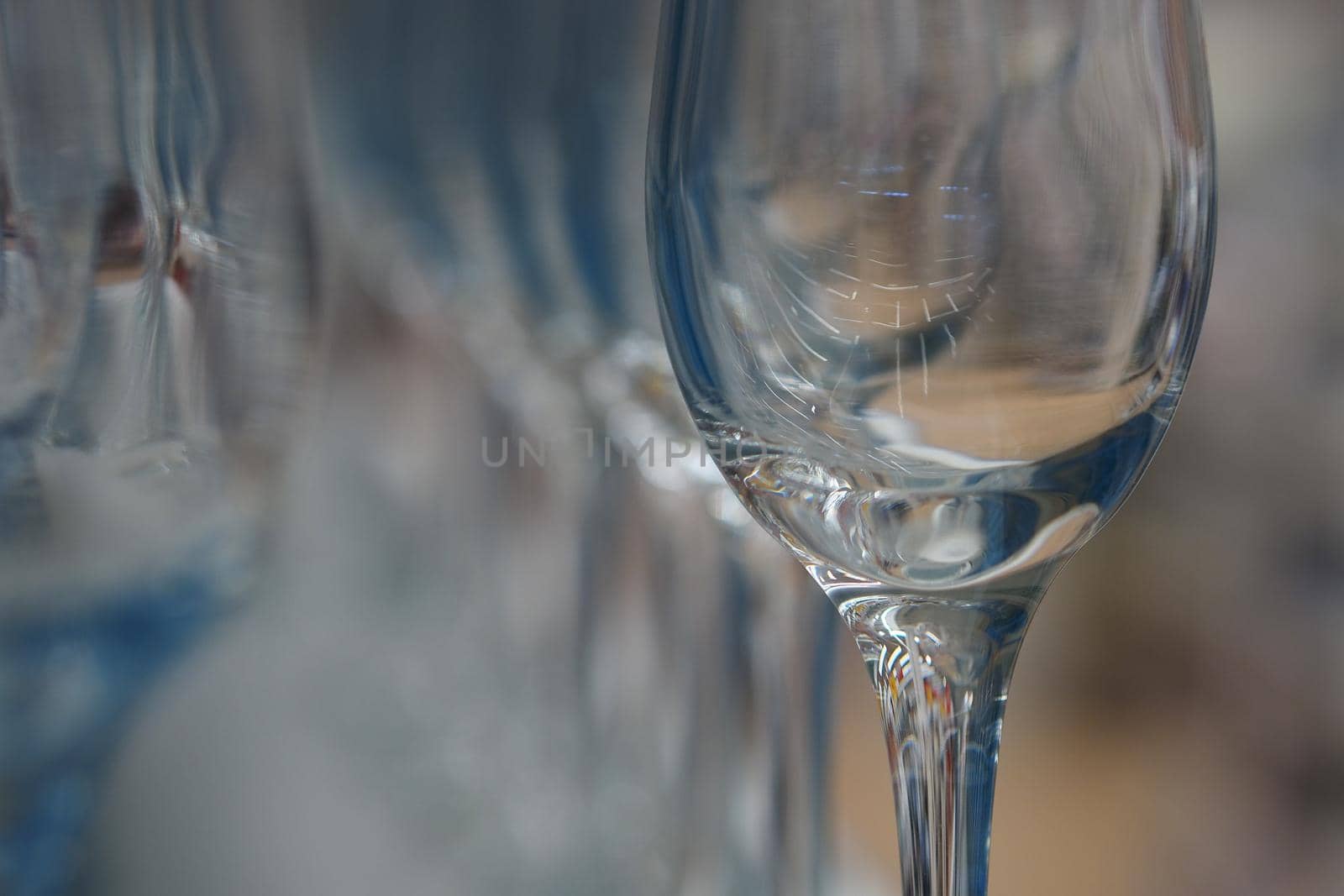 Empty glass wine glass on blurry background. Bokeh Background.