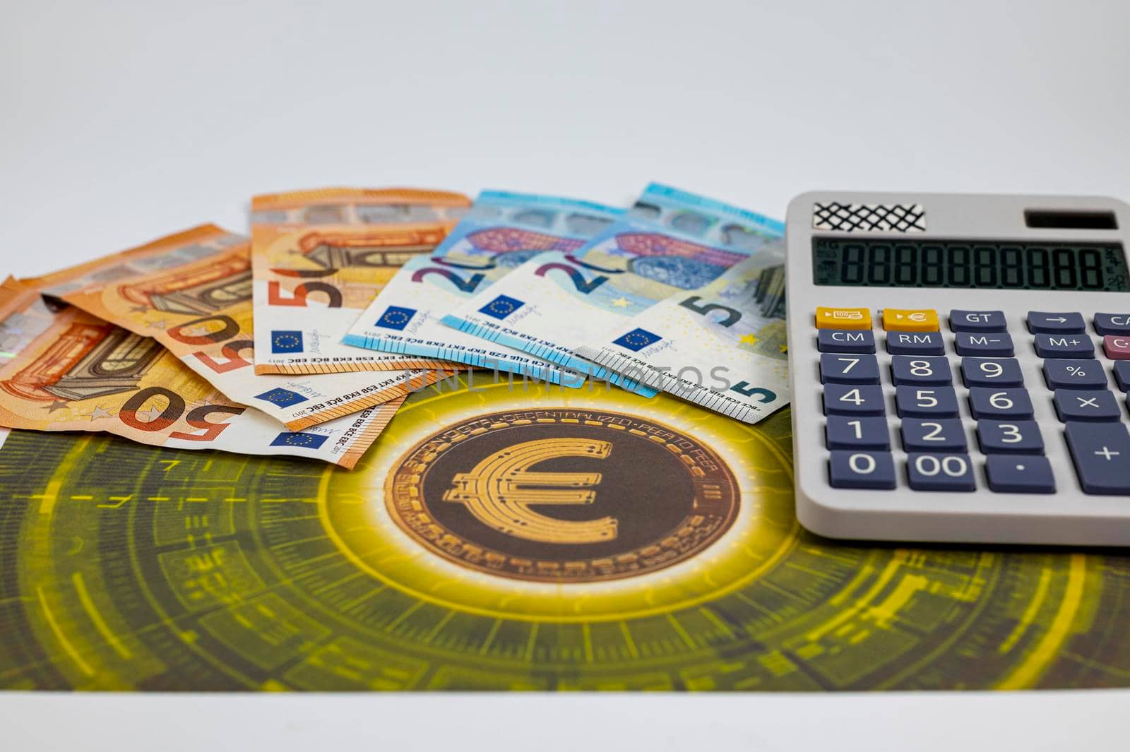 50 20 5 euro banknotes with euro symbol with calculator