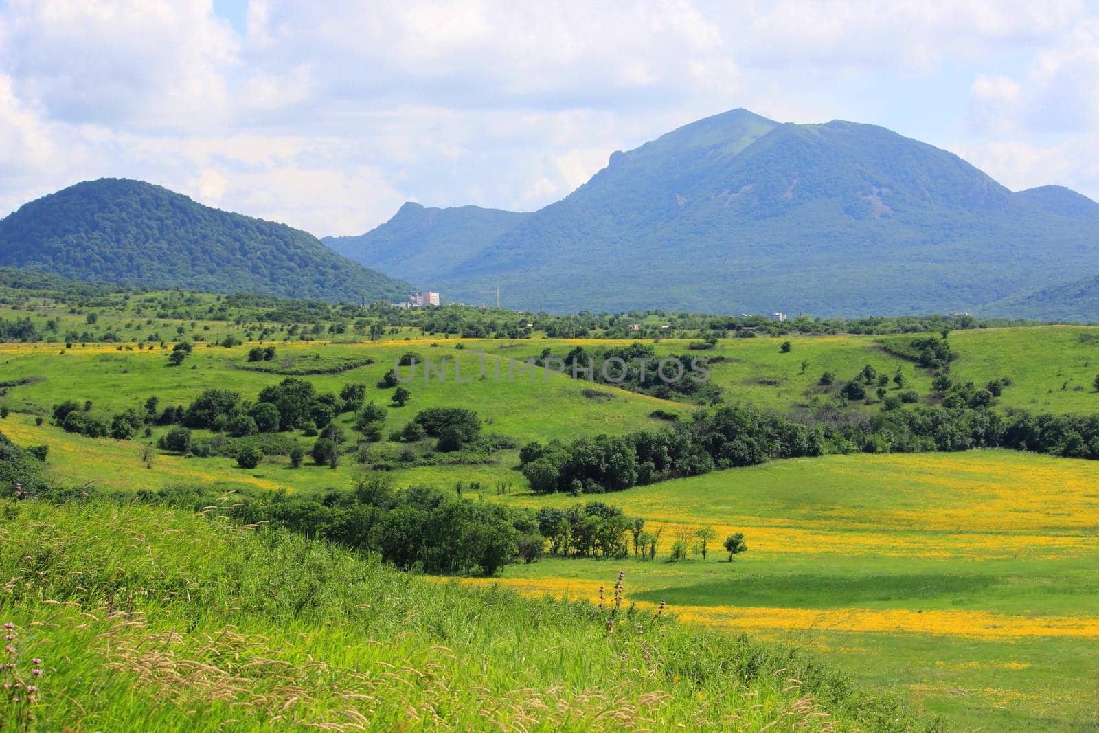 Mountain landscape, road to the mountains. Travel in the mountains.