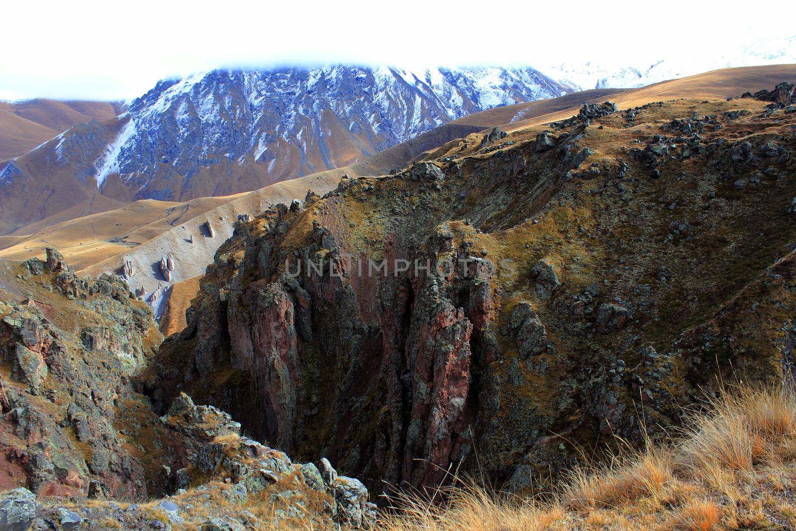 Beautiful mountain landscape, high mountains, cliffs, mountain river and tourist camp. High quality photo