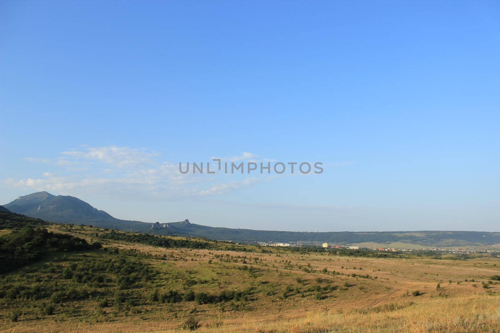 A natural landscape with mountains in the background. by Olga26