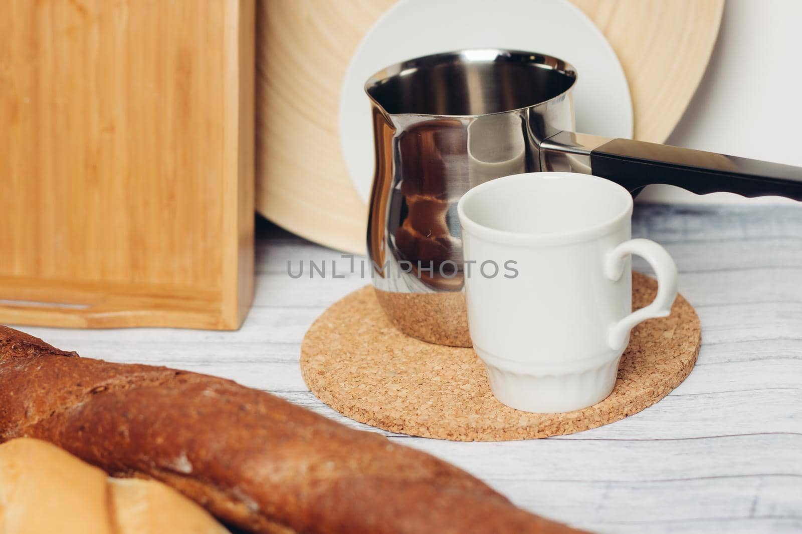 fresh baked goods on various table legs kitchen breakfast food diet. High quality photo