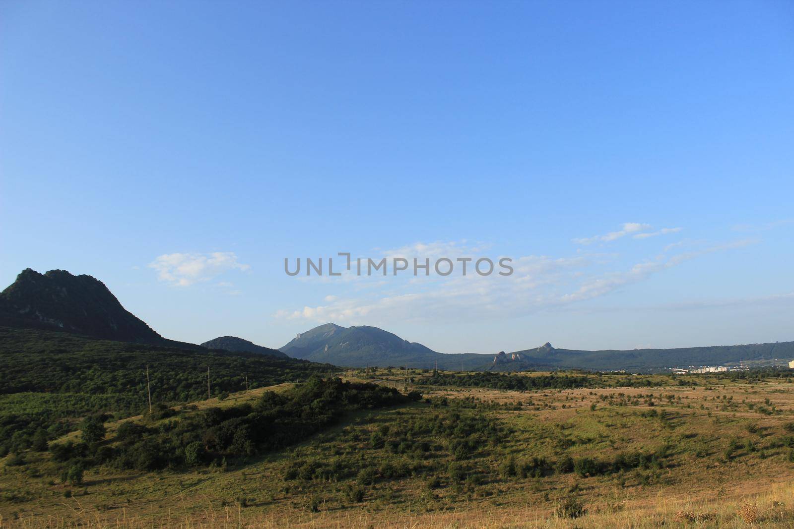 A natural landscape with mountains in the background. by Olga26