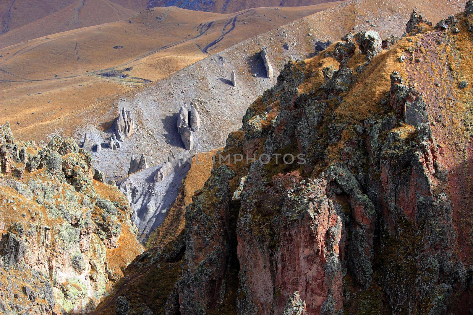 Beautiful mountain landscape, high mountains, cliffs, mountain river and tourist camp. High quality photo