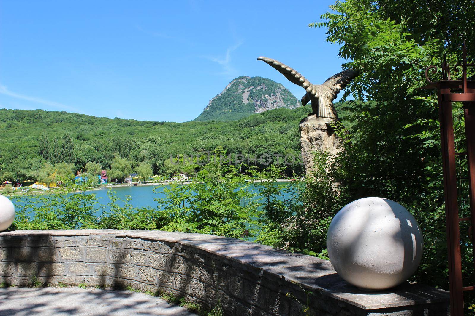 A decorative lake overlooking the mountain in the park.