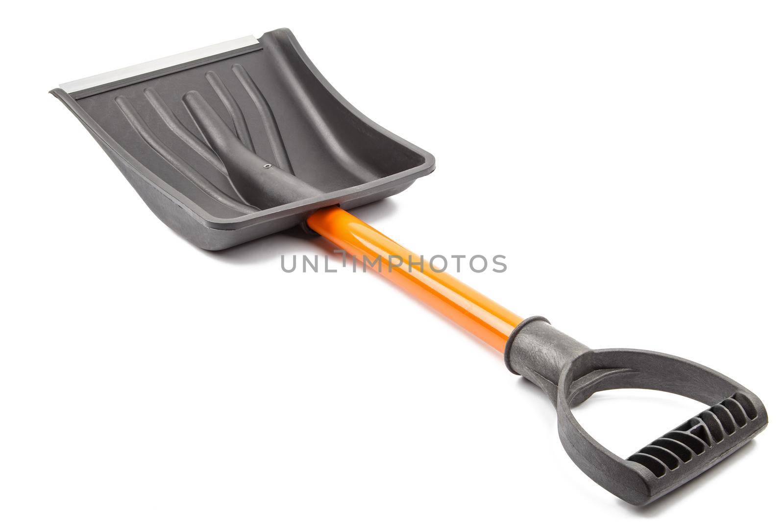 small plastic snow shovel, isolated on white background - back side, laid down, diagonal perspective handle toward camera