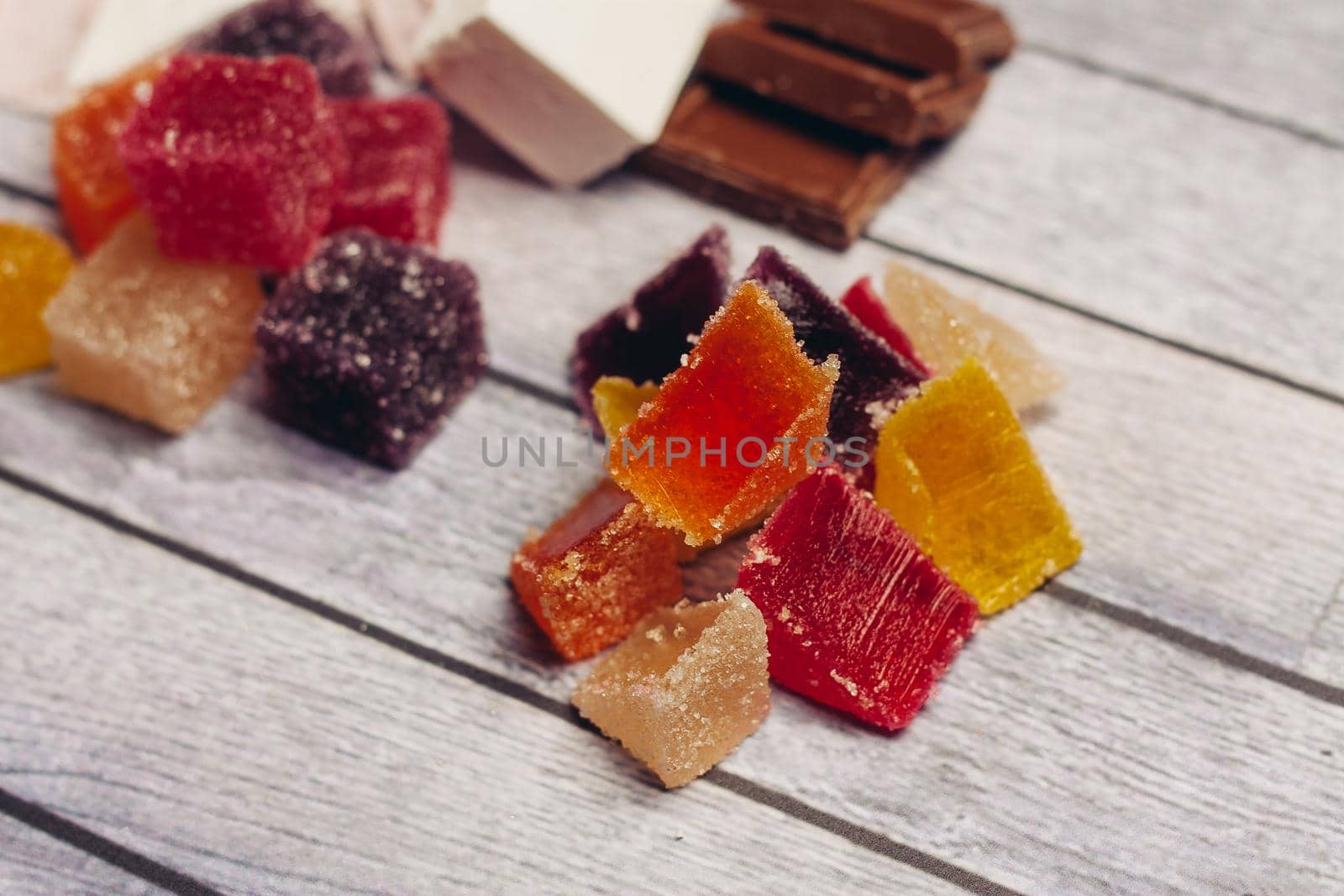 multicolored marmalade candy sweets dessert wooden background. High quality photo