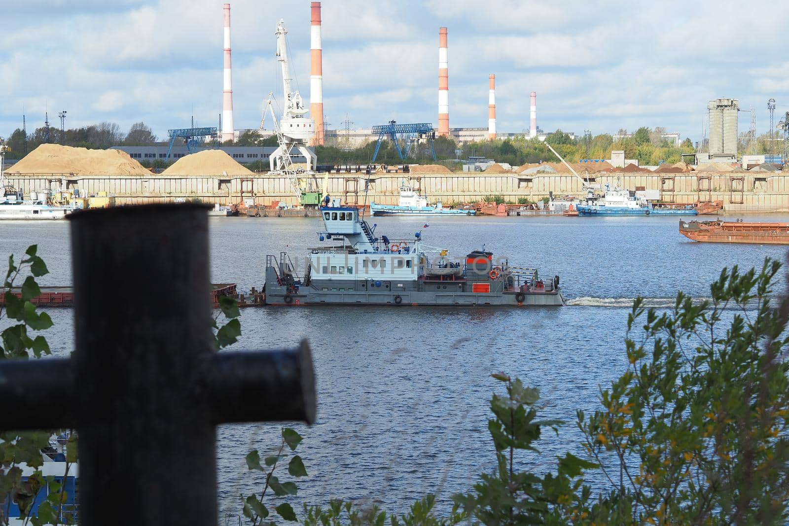 River. Seaport Production on water. Sand mining and shipping.