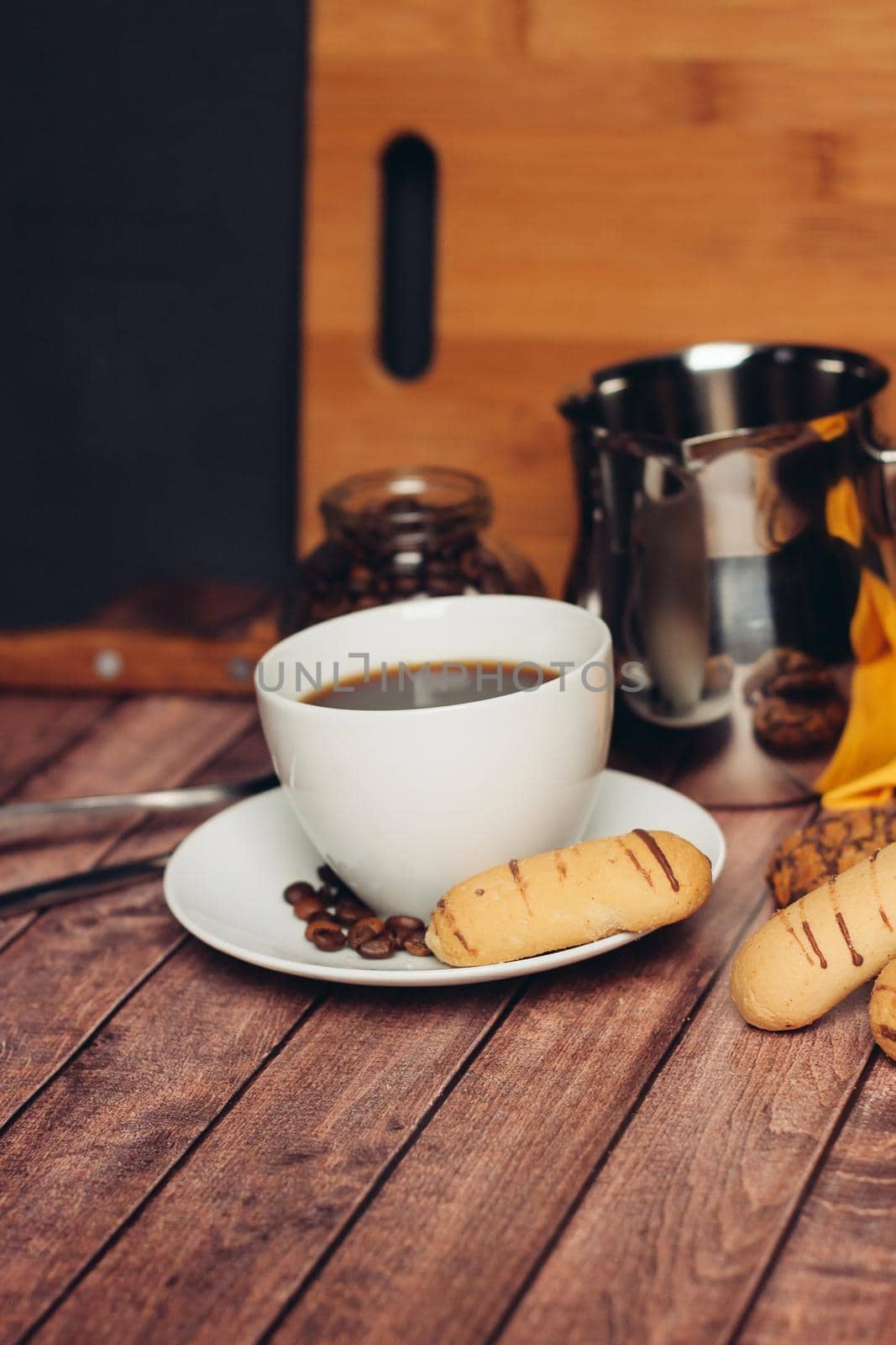 sweet biscuits on a plate a cup with a drink candy Dessert snack. High quality photo