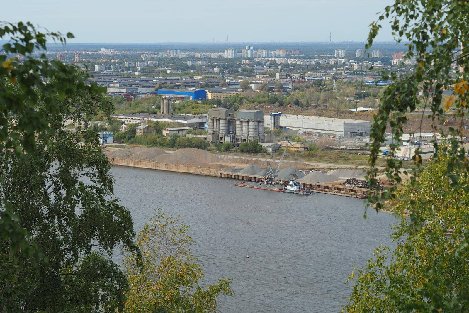 River. City by the river. Production on water. Sand mining and shipping. by Olga26