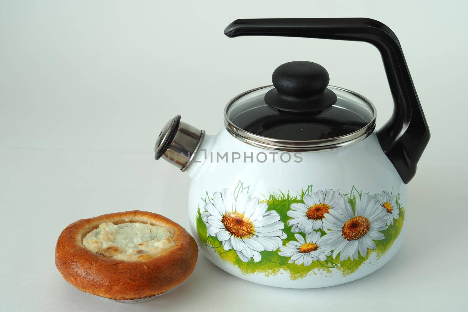 Enamelled utensils. Beautiful white enamelled kettle with whistle and pattern. by Olga26