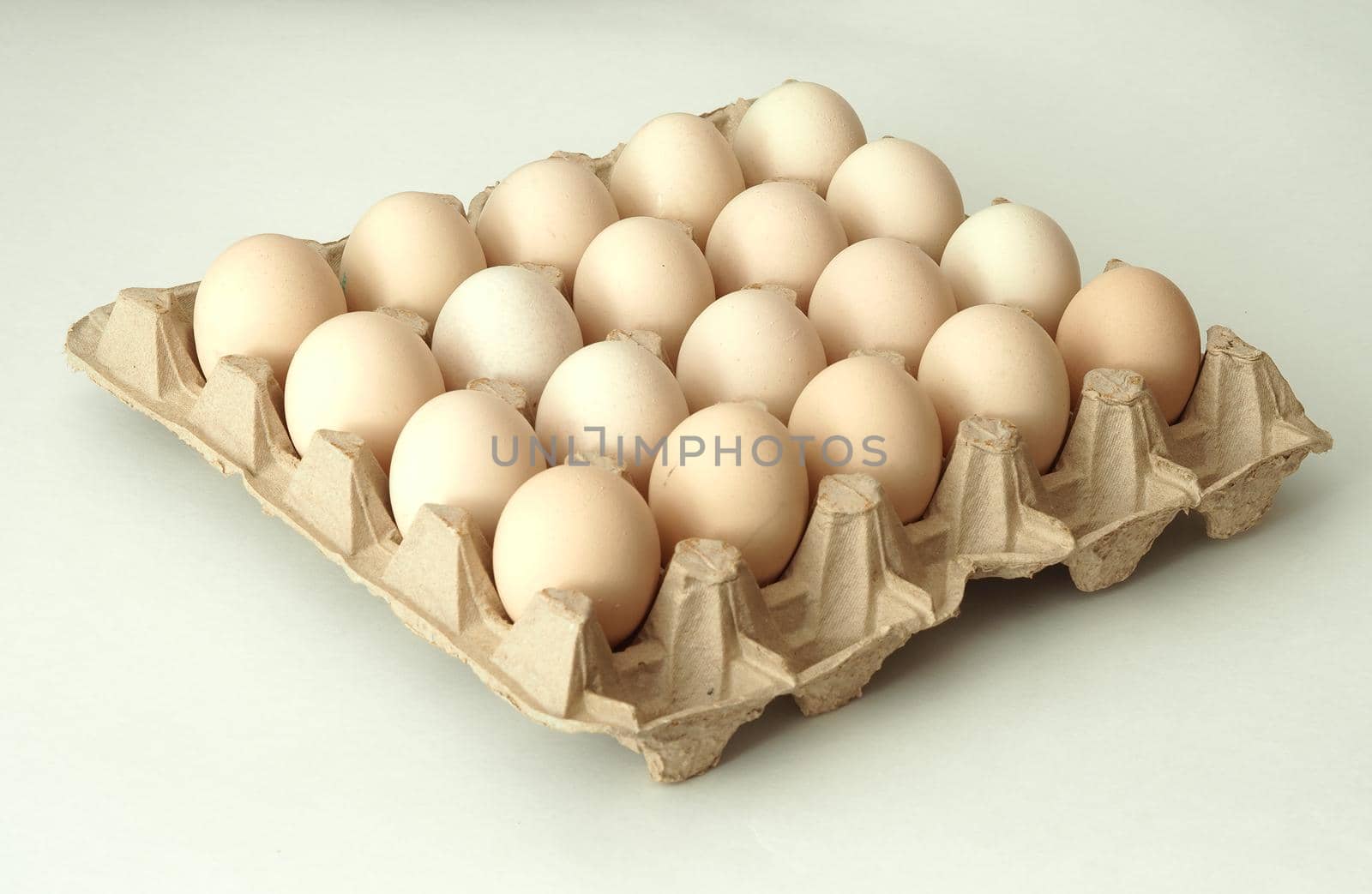 chicken eggs in a packachicken eggs in a package home village, large in an egg boxge homemade rustic. High quality photo