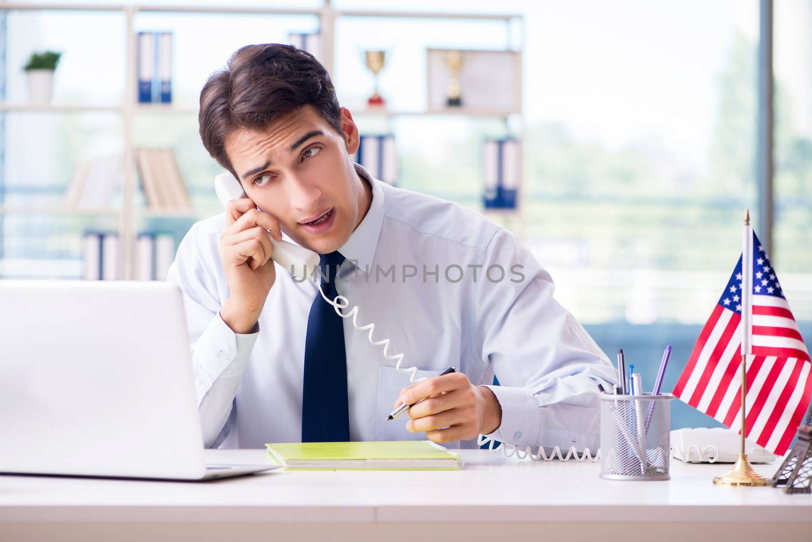 Sales agent working in travel agency