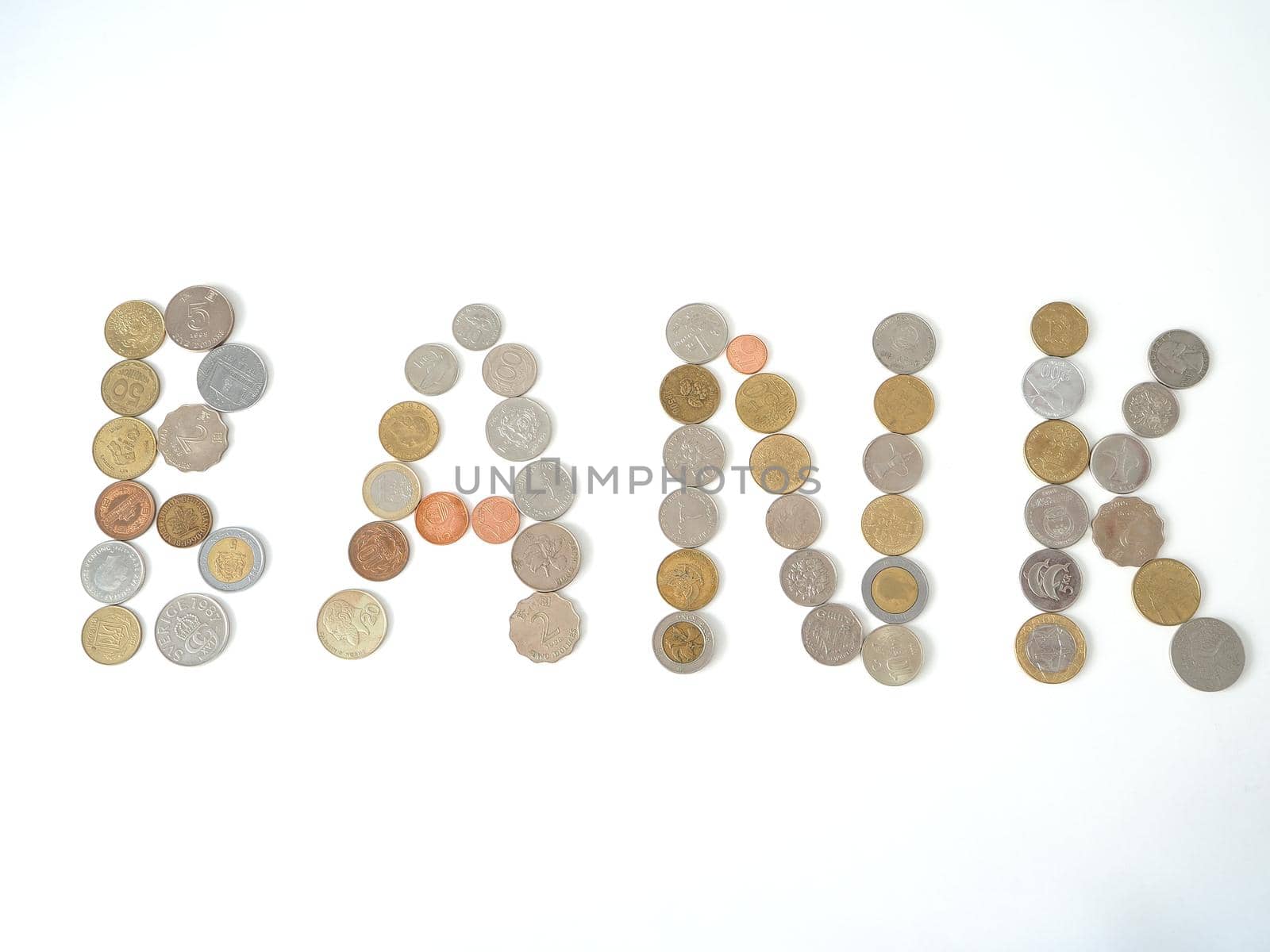 A collection of coins from different countries. Close-up