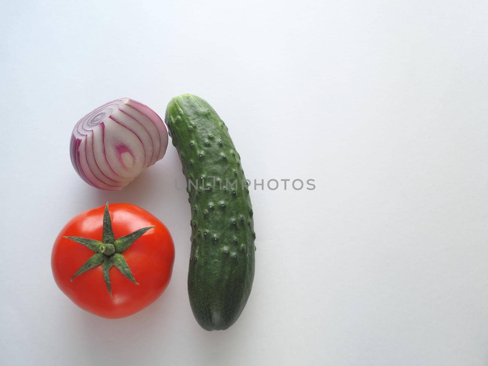 fresh vegetables for salad, close-up on a white background.