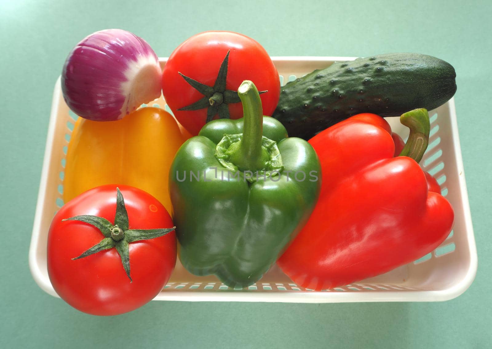 Ripe salad vegetables. Tomato cucumber salad with Bulgarian pepper.