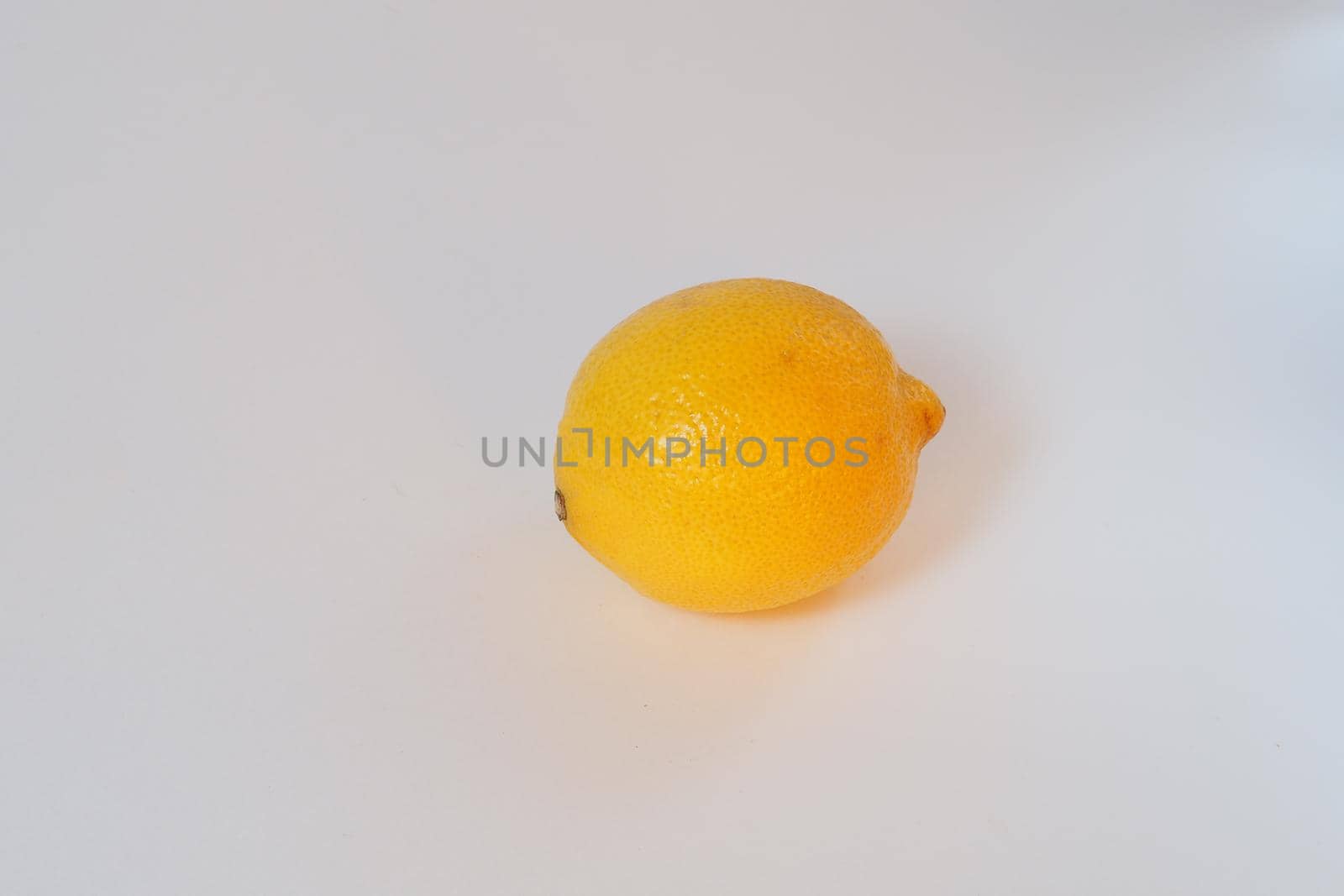 Lemon. Citrus yellow, whole. Close-up on a white background. High quality photo