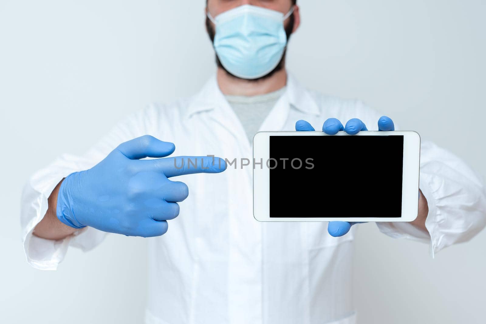 Male doctor holding tablet computer and virtual screen with picture of lungs on color background close-up of blank tablet screen in doctor hands Asian doctor or nurse holding tablet computer by nialowwa