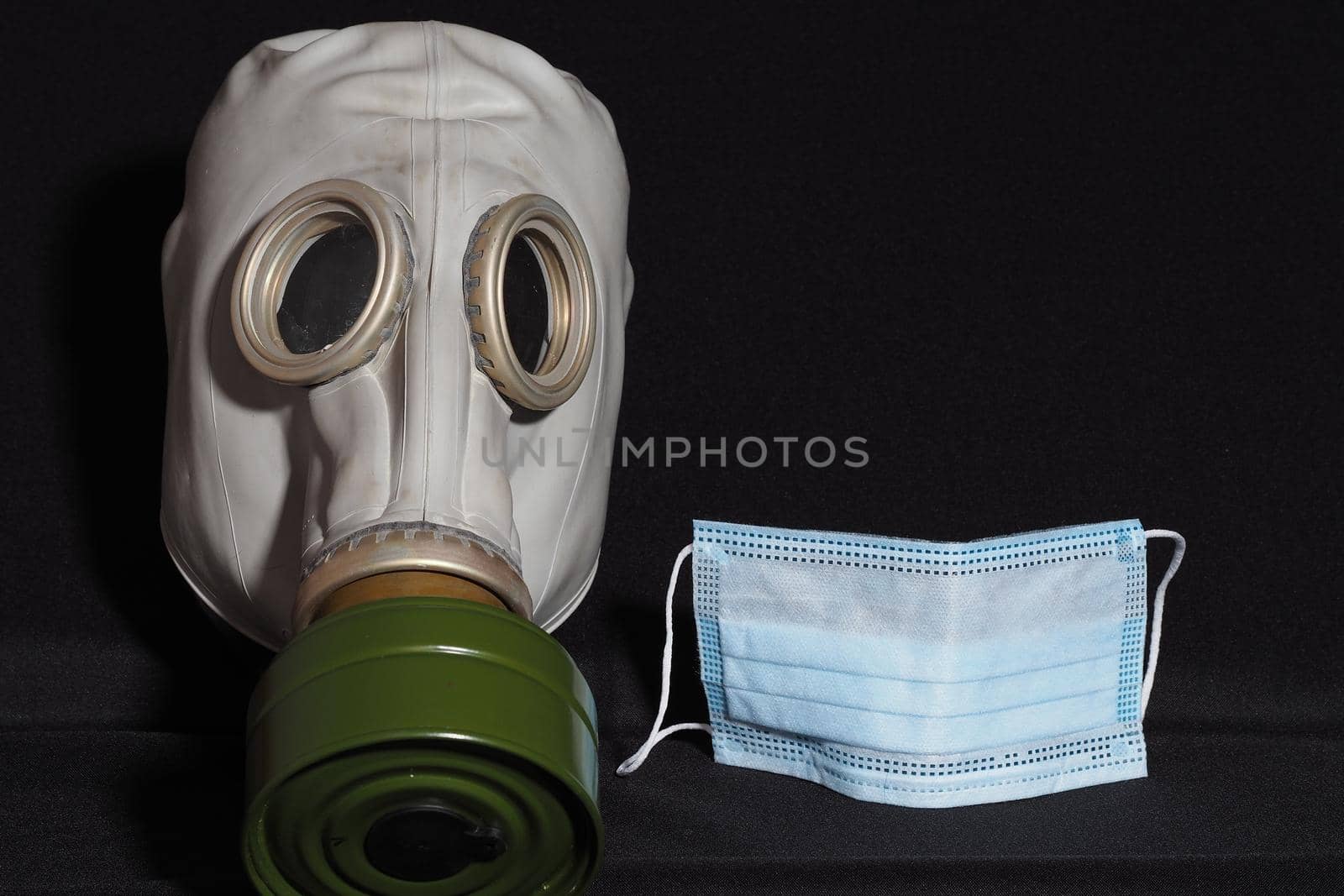 Personal protective equipment. Covid-19. A gas mask and a medical mask. by Olga26