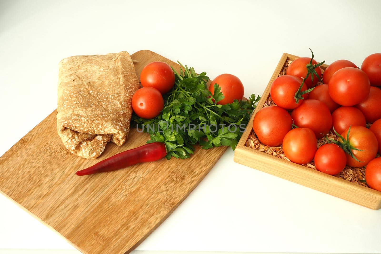 Thin pita bread with tomatoes and spices. Vegetarian homemade falafel. by Olga26