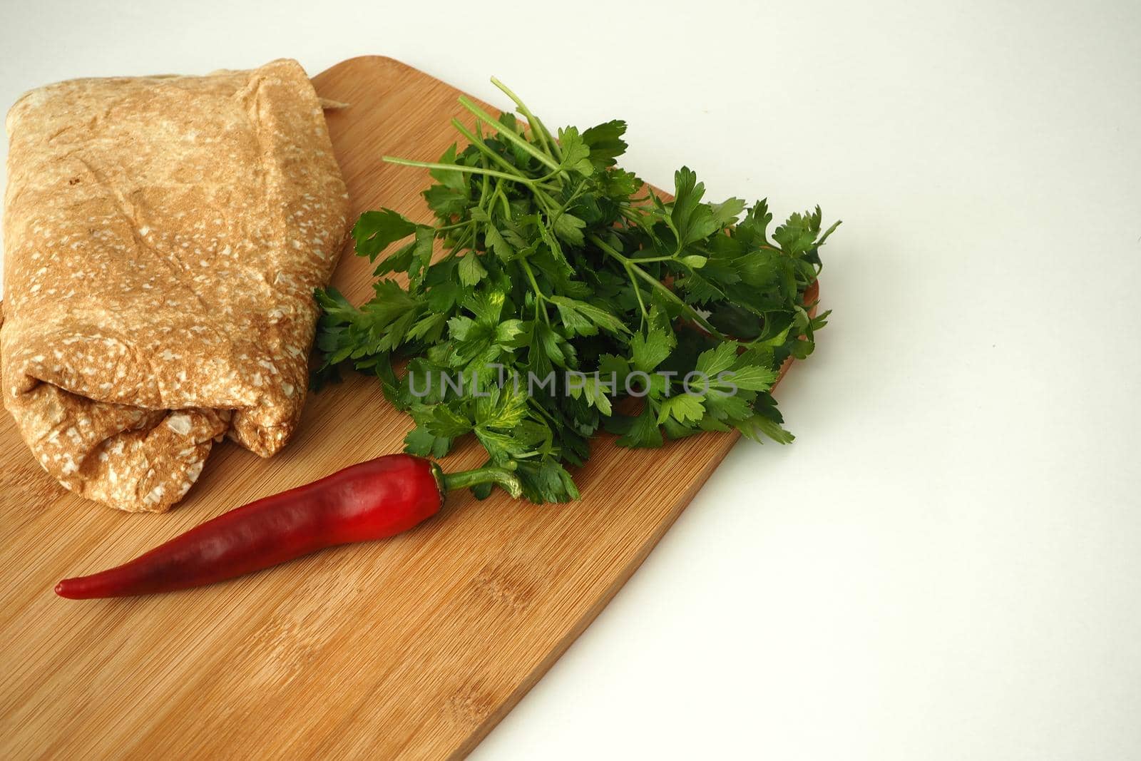 Thin pita bread with tomatoes and spices. Vegetarian homemade falafel. by Olga26