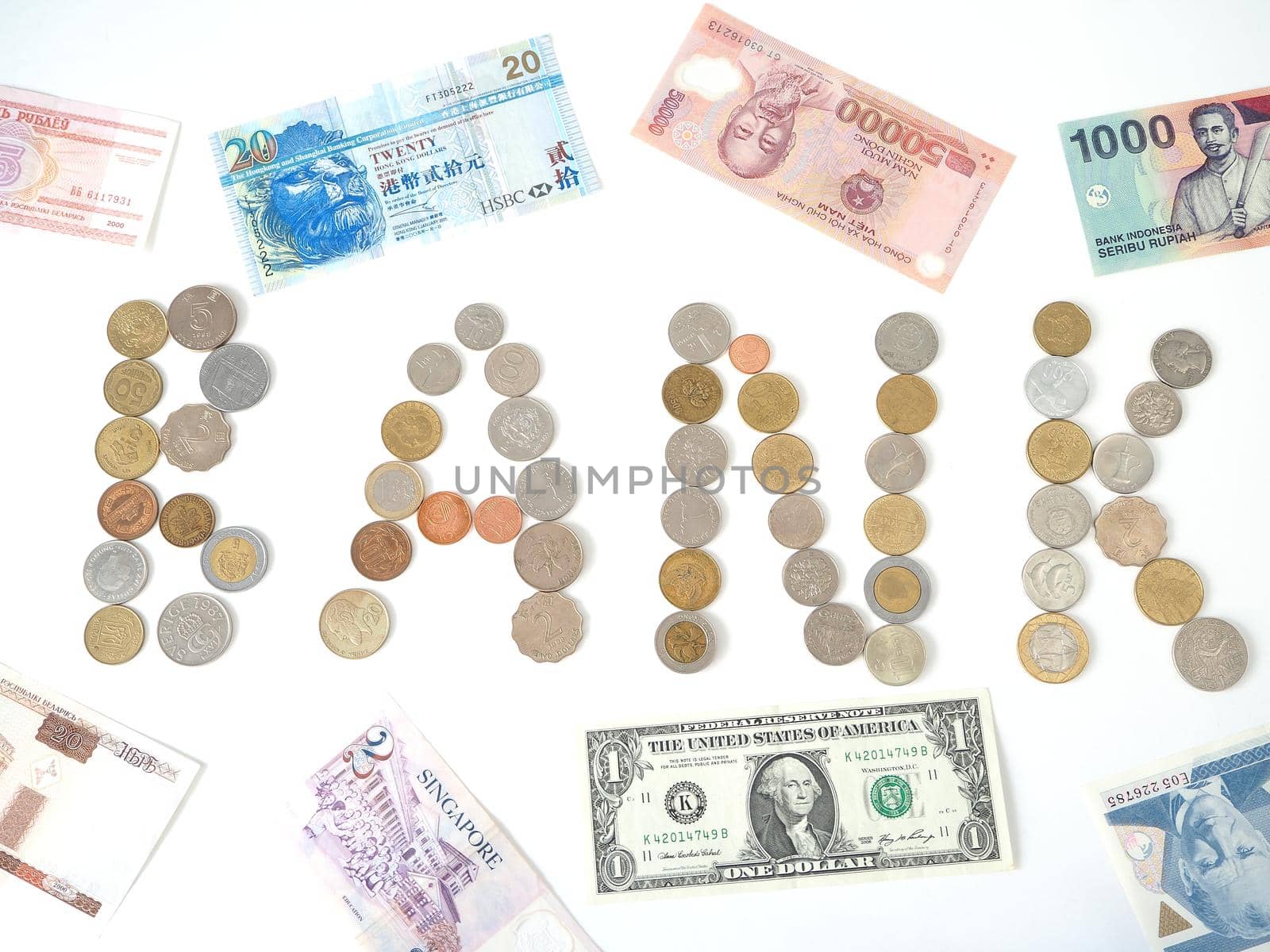 A collection of coins from different countries. Close-up