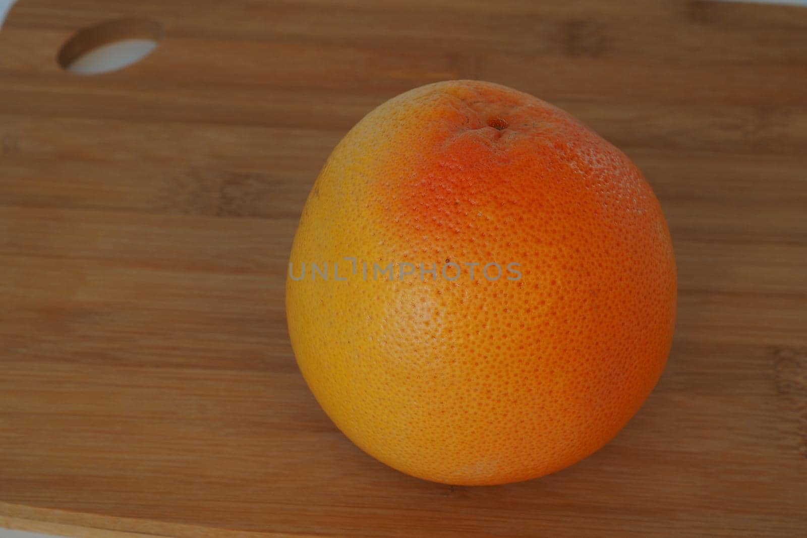 Citrus fruits. Orange on a wooden background. High quality photo. High quality photo